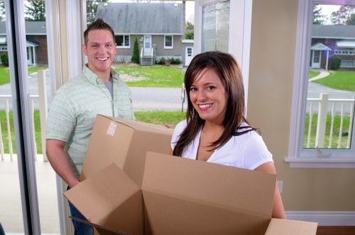 Office relocation planning in Holland Park with boxes and business equipment