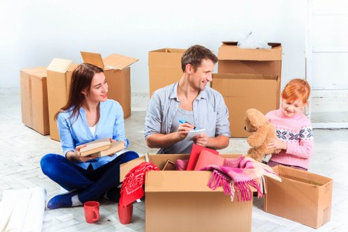 Removalists helping with a house move in Holland Park