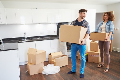 Office furniture and packed boxes prepared for a local commercial move