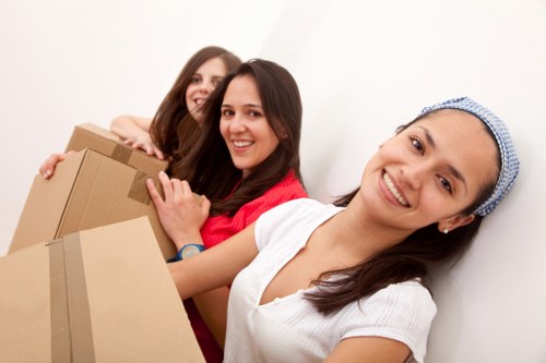 Packing boxes and furniture ready for storage near Holland Park