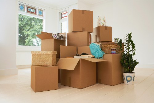 Packed household items ready for a home move in Holland Park