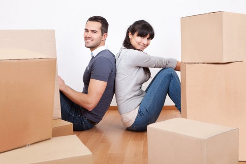 Careful moving of furniture through a Holland Park property