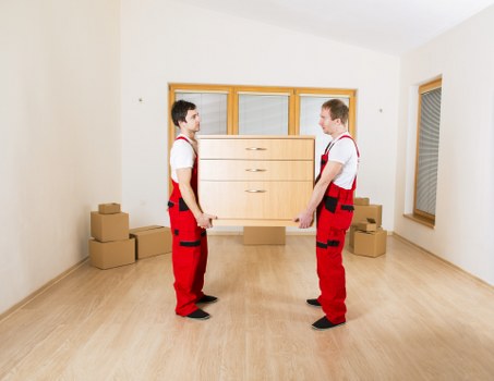 Professional movers planning a residential relocation in Holland Park
